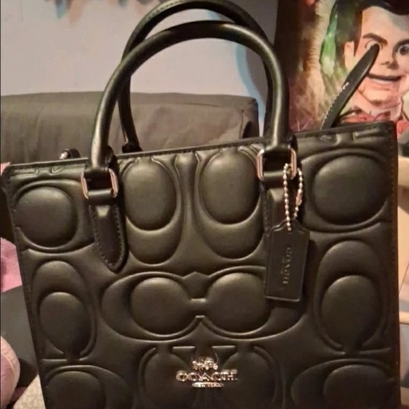 Coach Handbags - Small Maggie Coach Black Quilted Purse with Gold Hardware